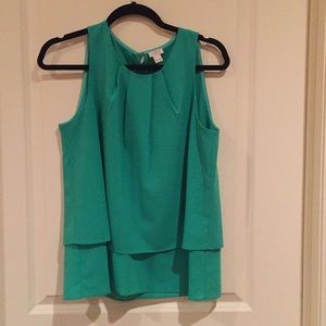 Sleeveless green blouse